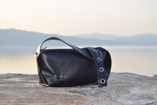 Elegant designer crossbody bag in premium Italian goat leather with silver rings and O-ring detail – timeless handmade craftsmanship by Santebela.
