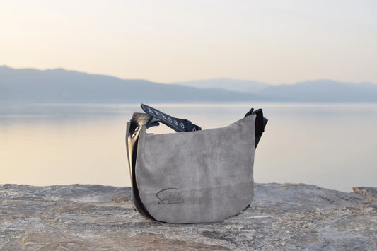 Minimalist luxury velour gray crossbody bag with black leather strap – handmade craftsmanship by Santebela