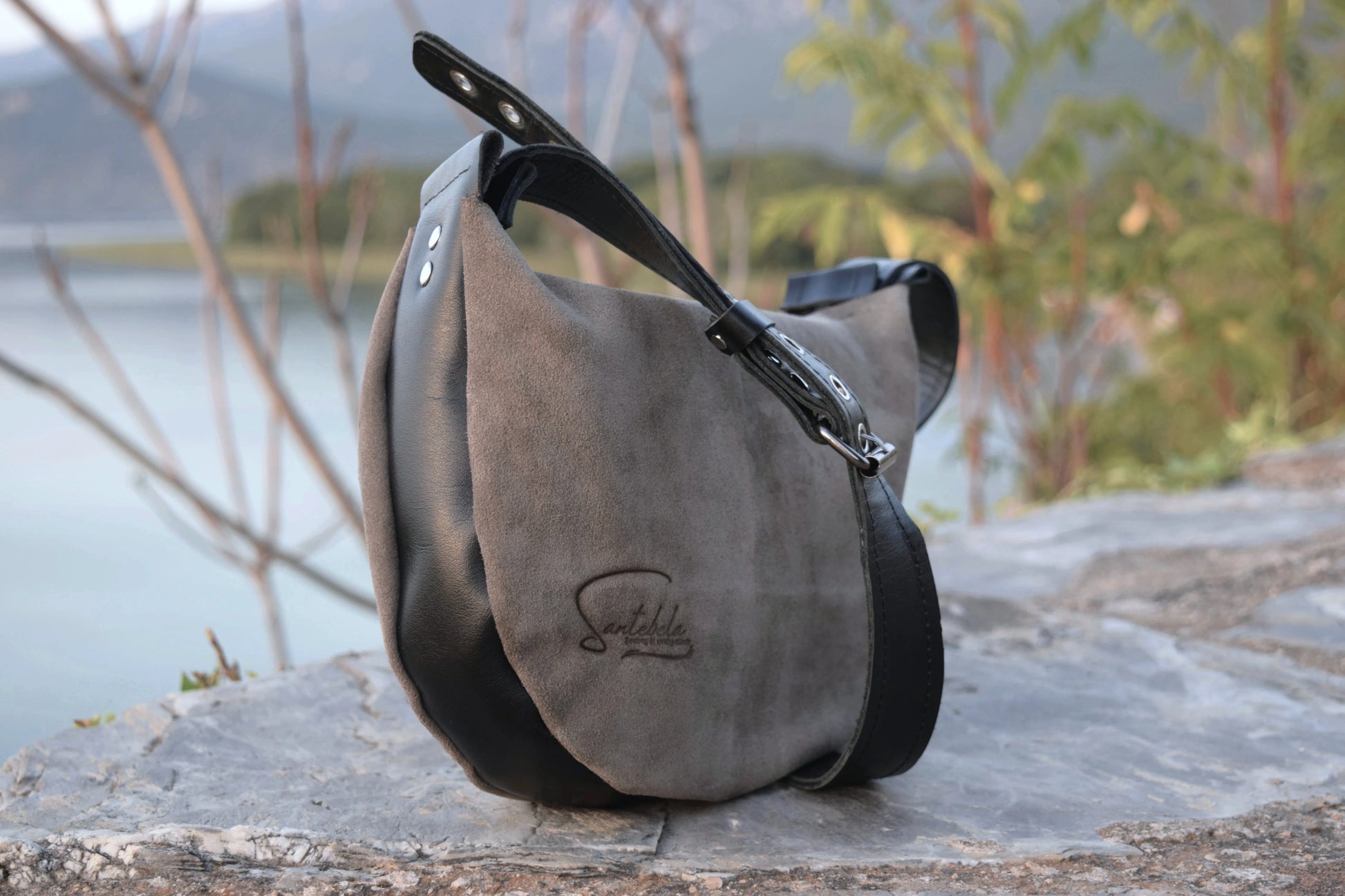 Minimalistic gray suede Italian leather with a black adjustable strap and silver rings, handmade by Santebela