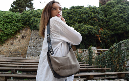 Minimalistic gray velour with metallic rivets presented by our model from Santebela with love