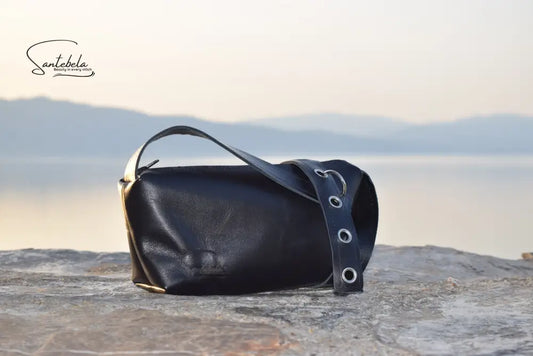 Elegant designer crossbody bag in premium Italian goat leather with silver rings and O-ring detail – timeless handmade craftsmanship by Santebela.