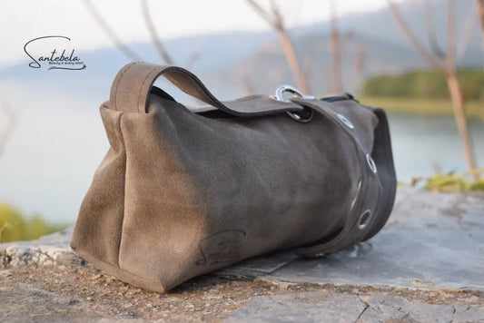 Elegant versatile shoulder bag in soft grey Italian calfskin leather with refined stitching and subtle hardware – timeless handmade craftsmanship by Santebela