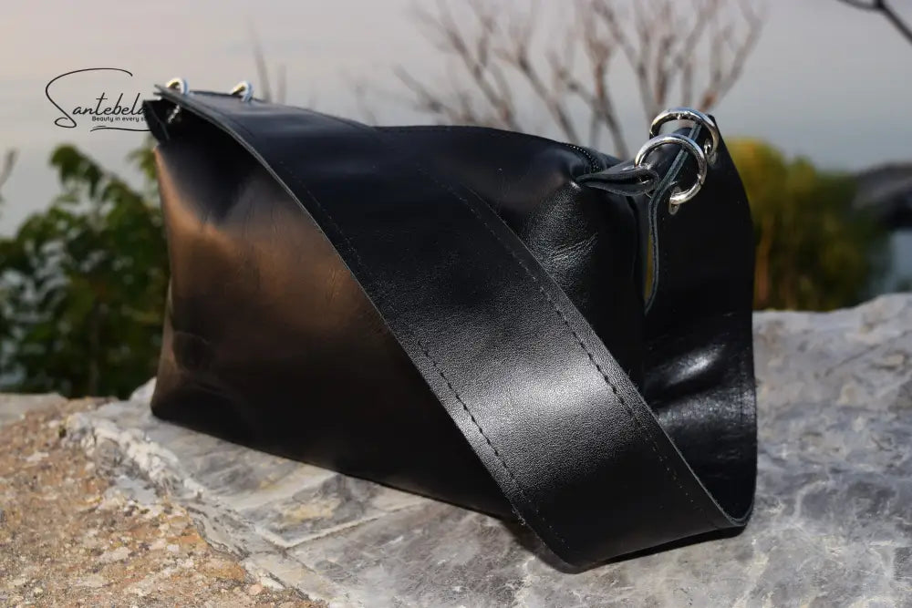 Luxurious wide-strap handbag in premium black Italian leather black stitching, black zipper black is a timeless luxury by Santebela.