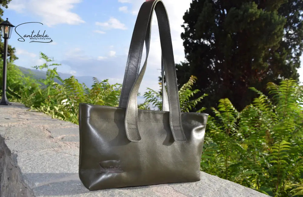 Dark Green Olive Leather Tote Bag, front view, crafted from supple Italian calfskin with polished silver magnets and black stitching by Santebela.